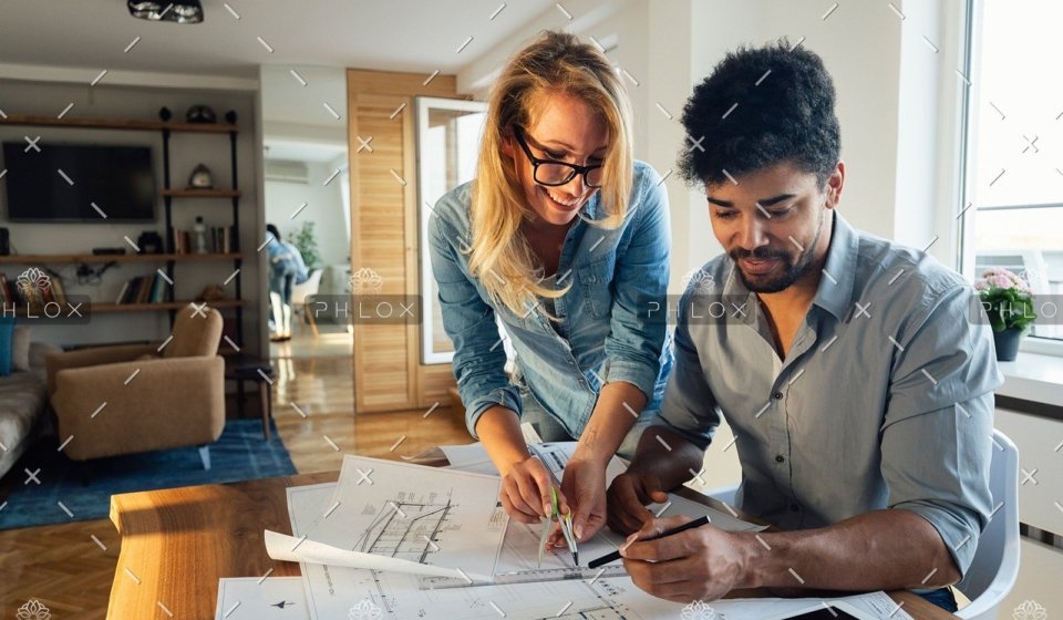 demo-attachment-466-architect-colleagues-working-in-office-HMYR4KD