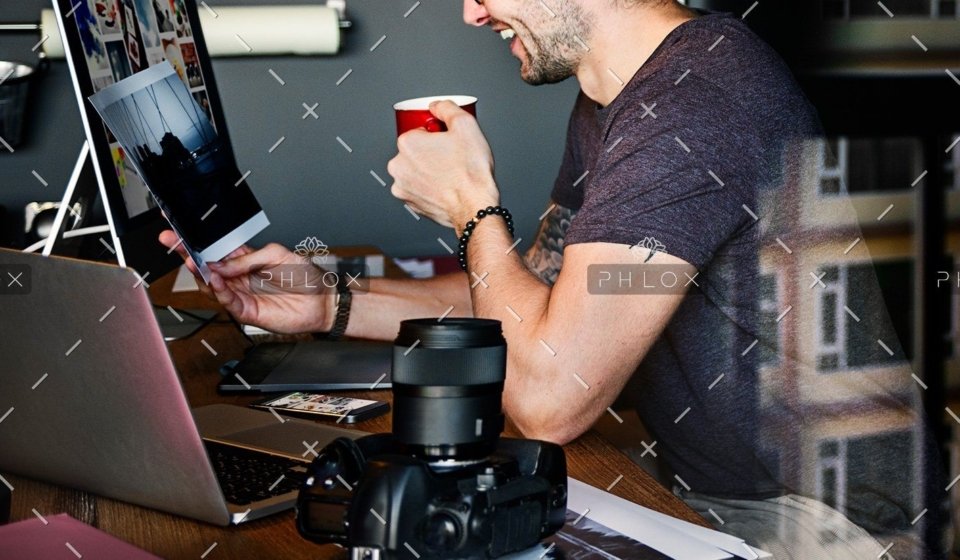 demo-attachment-485-photographer-journalist-working-studion-agency-PWTYFR5